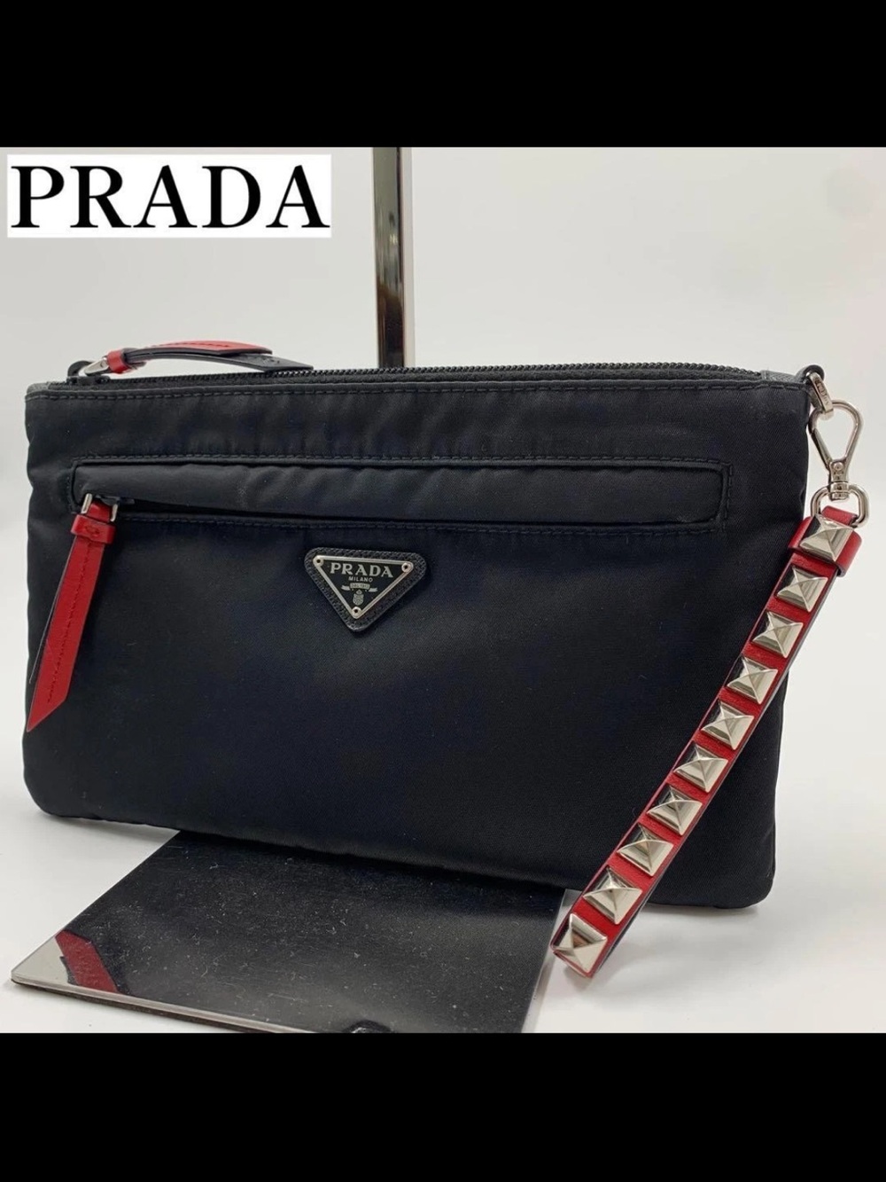 Prada Black Nylon Clutch with Red Studded Strap